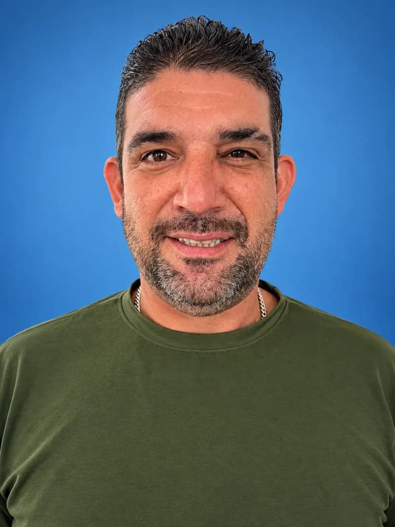 Luis E.